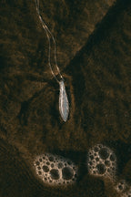 crest pendant necklace
